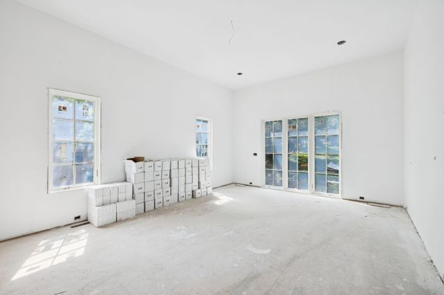 an empty room with windows