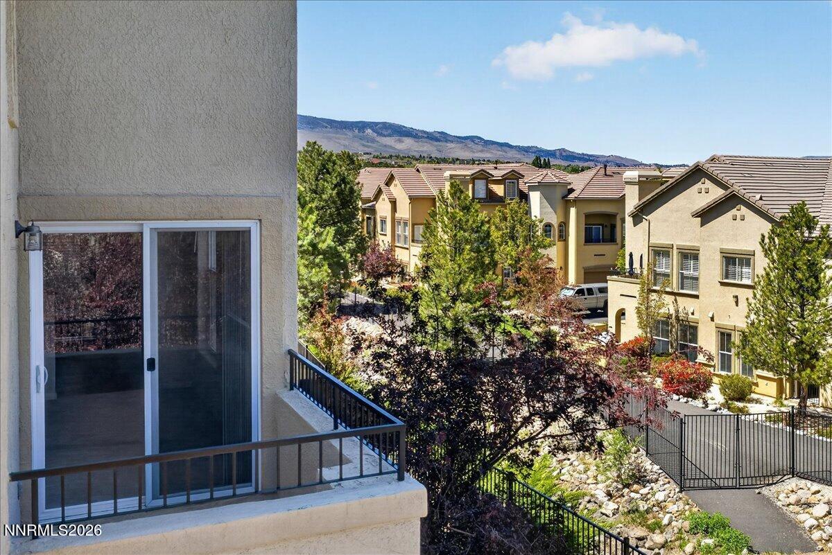 17000 Wedge Parkway, Unit 1525 Reno, NV 89511 - Photo 13 of 42 front view of a house with a garden