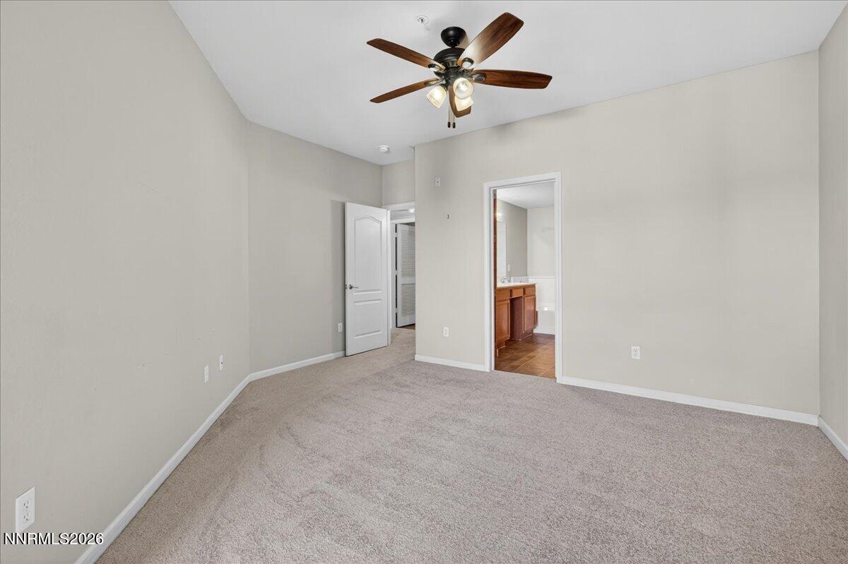 17000 Wedge Parkway, Unit 1525 Reno, NV 89511 - Photo 22 of 42 a view of a big room with closet and a ceiling fan