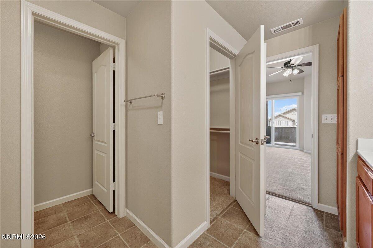 17000 Wedge Parkway, Unit 1525 Reno, NV 89511 - Photo 23 of 42 a view of a bathroom from a hallway