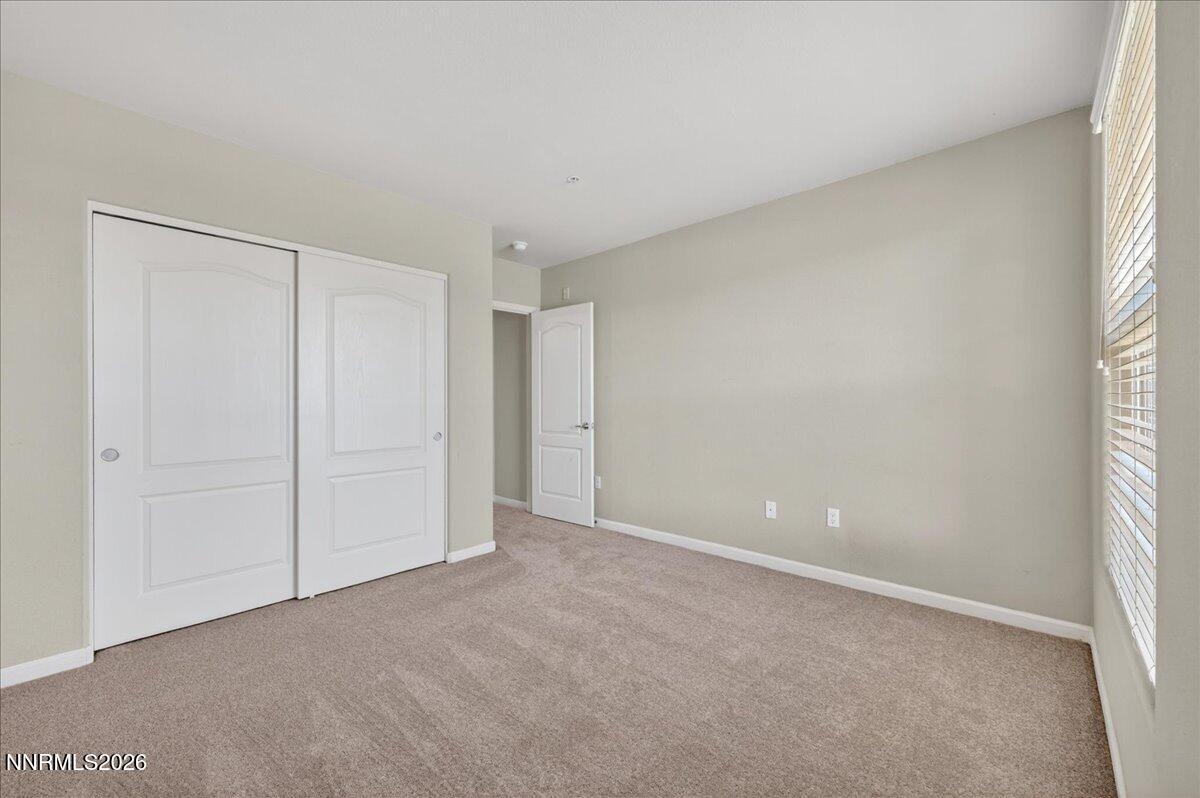 17000 Wedge Parkway, Unit 1525 Reno, NV 89511 - Photo 27 of 42 a view of an empty room and window