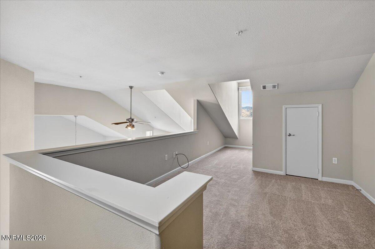 17000 Wedge Parkway, Unit 1525 Reno, NV 89511 - Photo 32 of 42 a view of an empty room with closet