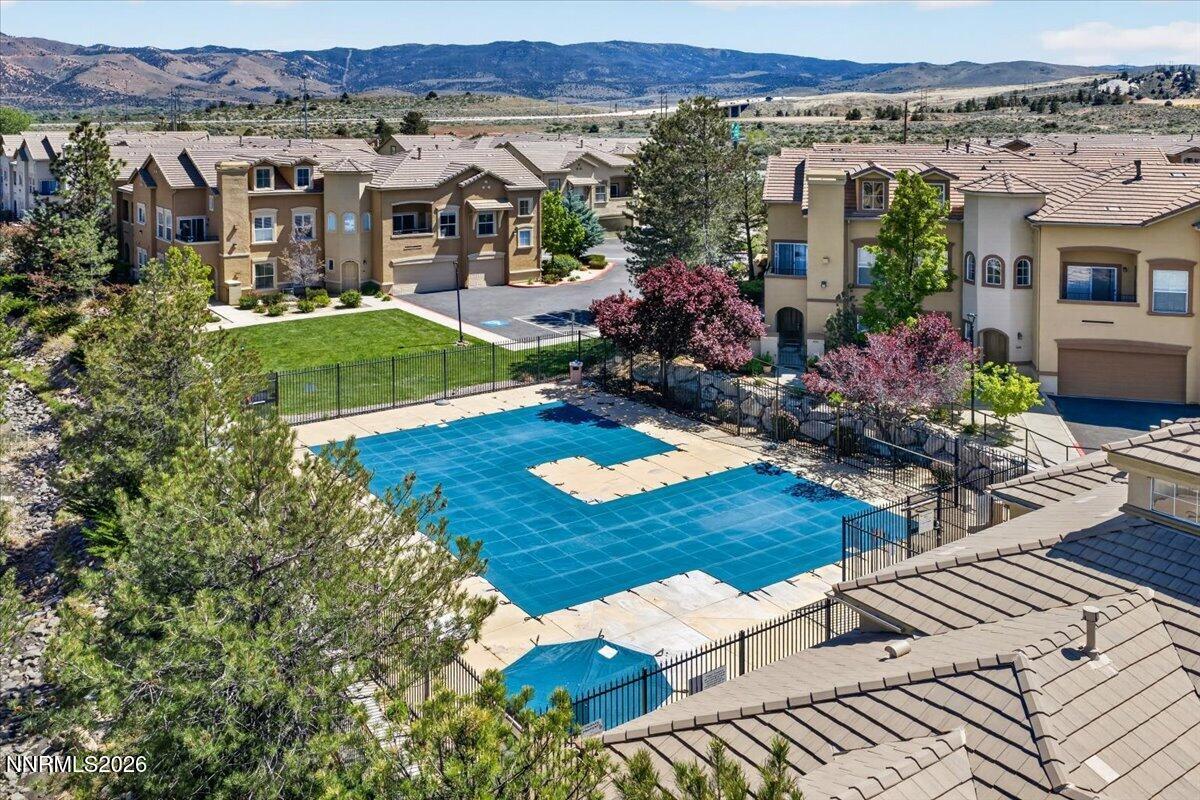 17000 Wedge Parkway, Unit 1525 Reno, NV 89511 - Photo 40 of 42 a view of multiple houses with a yard