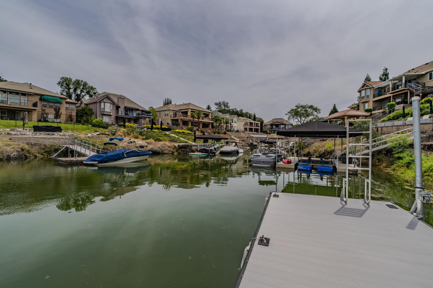 6066 Bluff View Road Copperopolis, CA 95228 - Photo 84 of 96 a view of water with boats and trees in the background