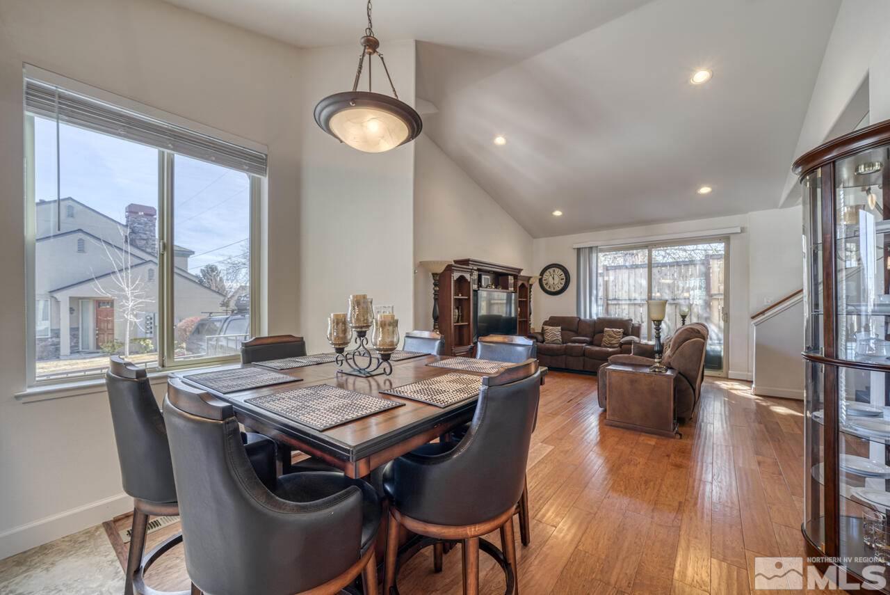 3677 Warren Way, Unit A Reno, NV 89509 - Photo 15 of 22 a view of a dining room with furniture window and wooden floor