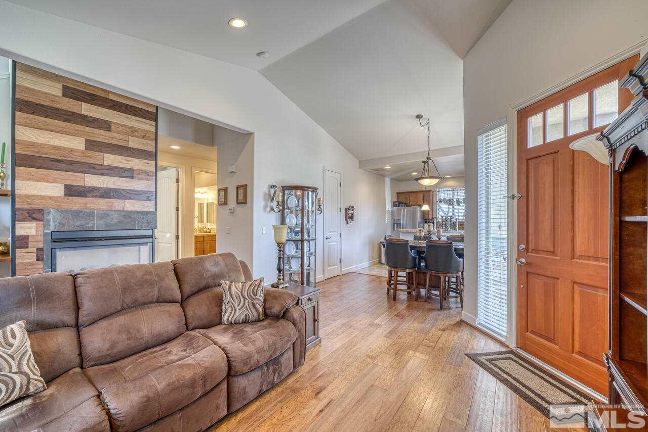 3677 Warren Way, Unit A Reno, NV 89509 - Photo 17 of 22 a living room with furniture window and wooden floor