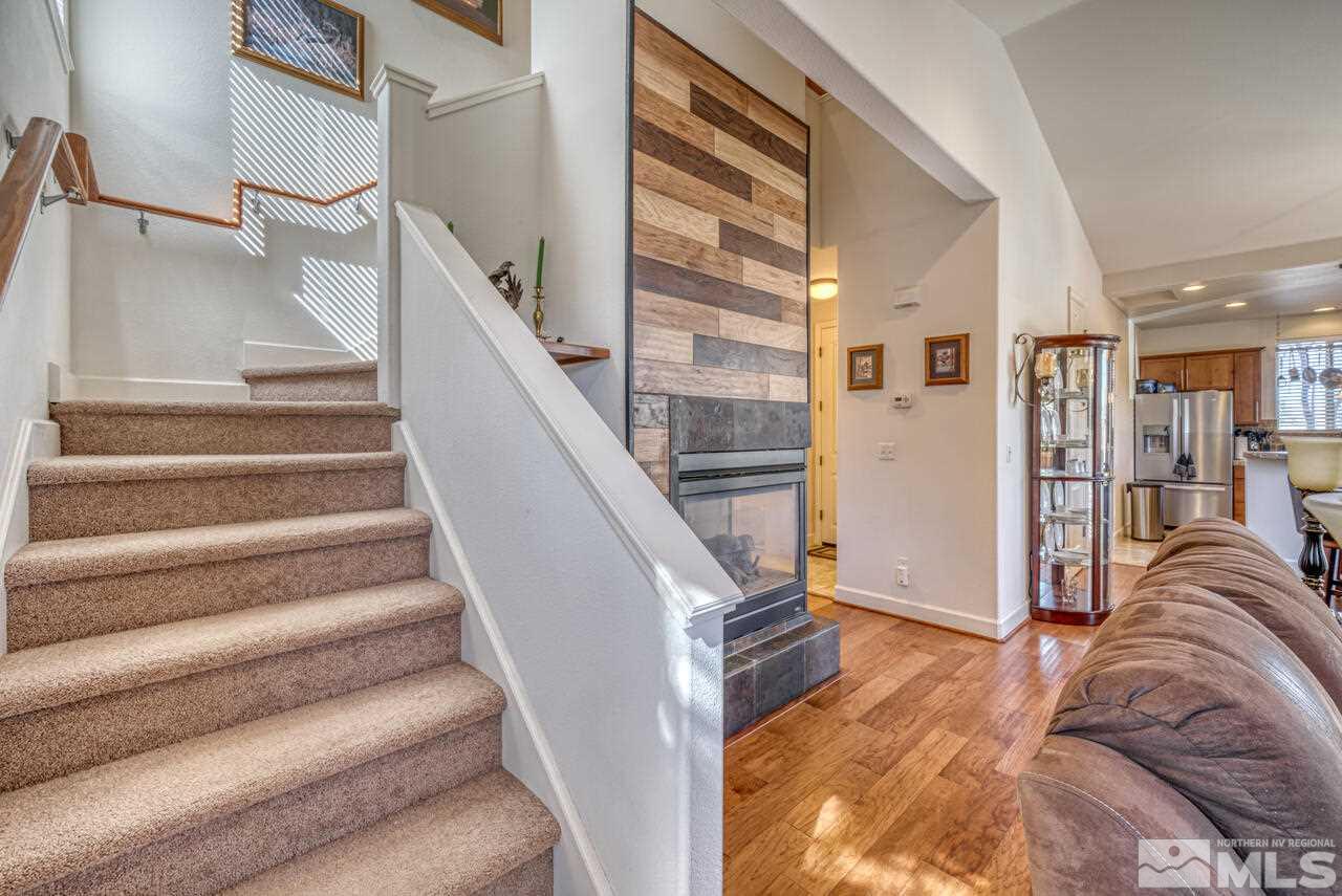 3677 Warren Way, Unit A Reno, NV 89509 - Photo 18 of 22 a view of entryway and hall with wooden floor