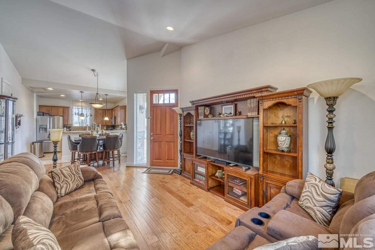 3677 Warren Way, Unit A Reno, NV 89509 - Photo 19 of 22 a living room with furniture and a flat screen tv