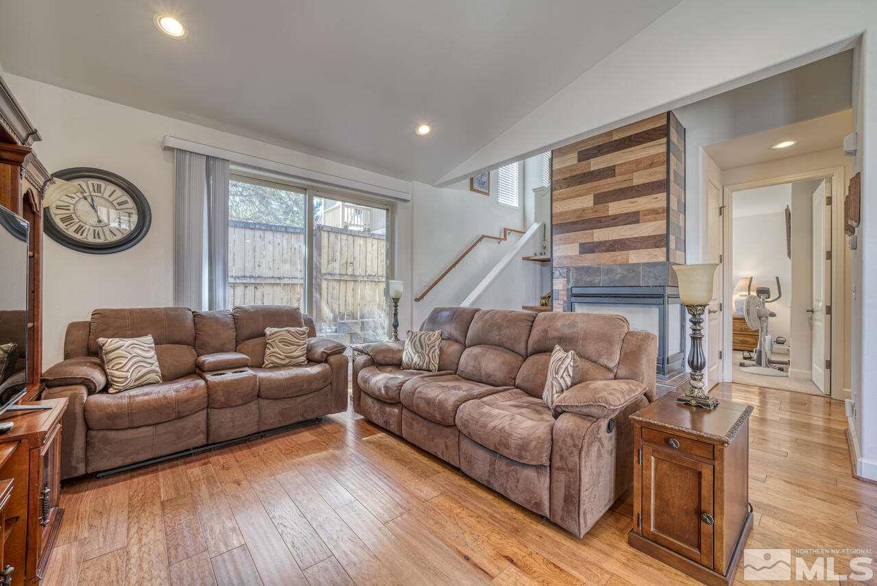 3677 Warren Way, Unit A Reno, NV 89509 - Photo 21 of 22 a living room with furniture and a large window