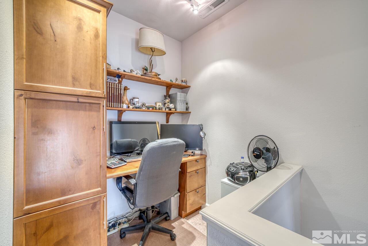 3677 Warren Way, Unit A Reno, NV 89509 - Photo 5 of 22 a view of workspace with wooden floor