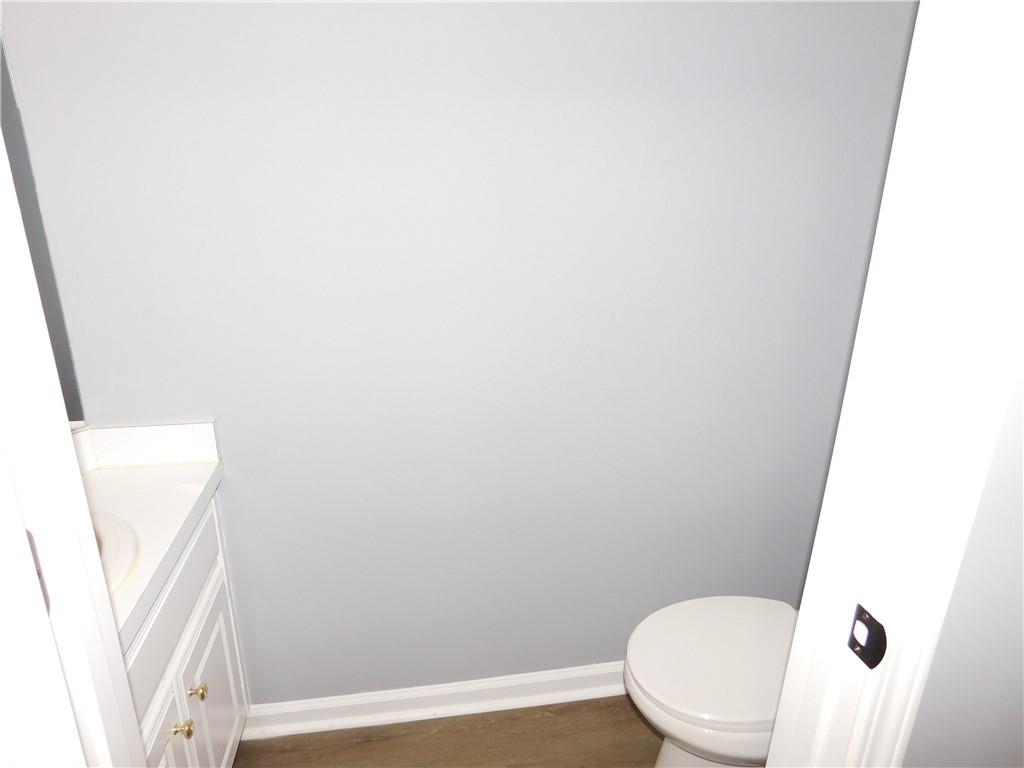 2614 Carolina Court Bethlehem, GA 30620 - Photo 23 of 42 a white toilet sitting next to a shower