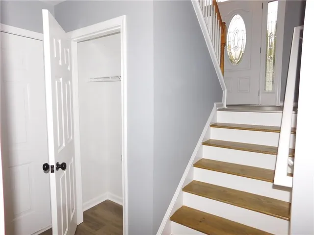 a view of a livingroom with wooden floor