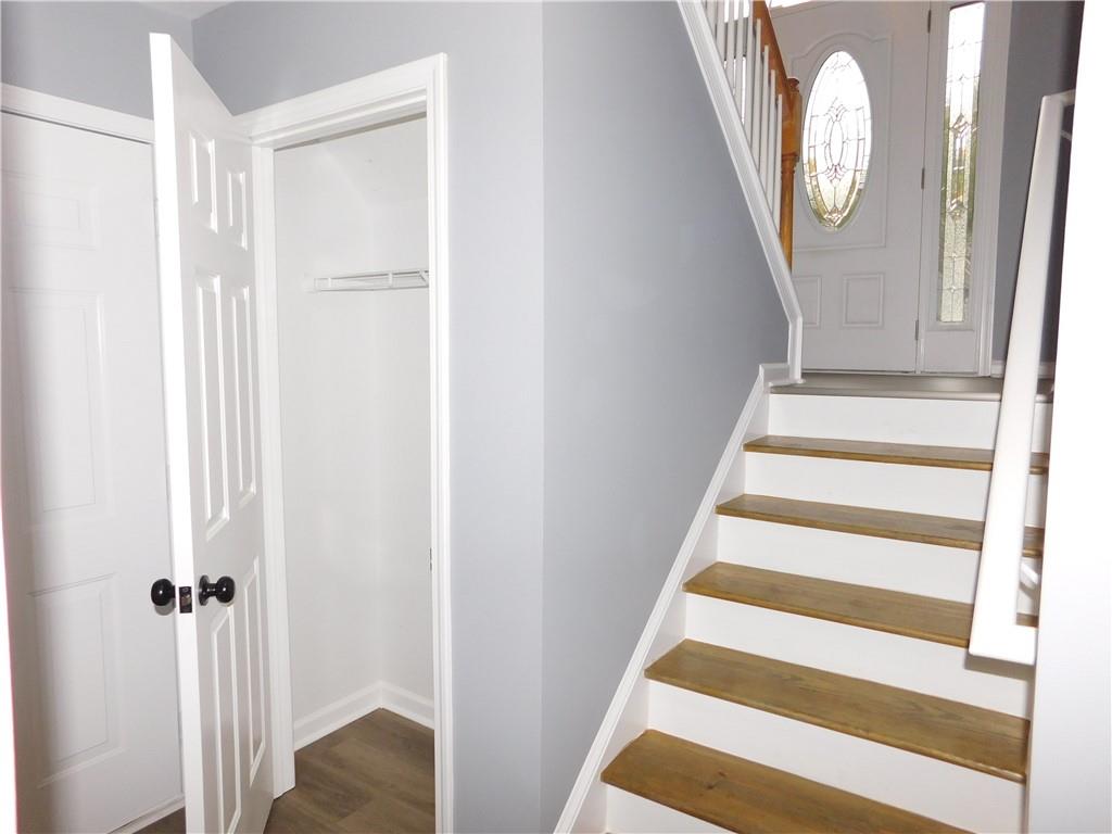 2614 Carolina Court Bethlehem, GA 30620 - Photo 30 of 42 a view of a hallway with windows and bathroom view