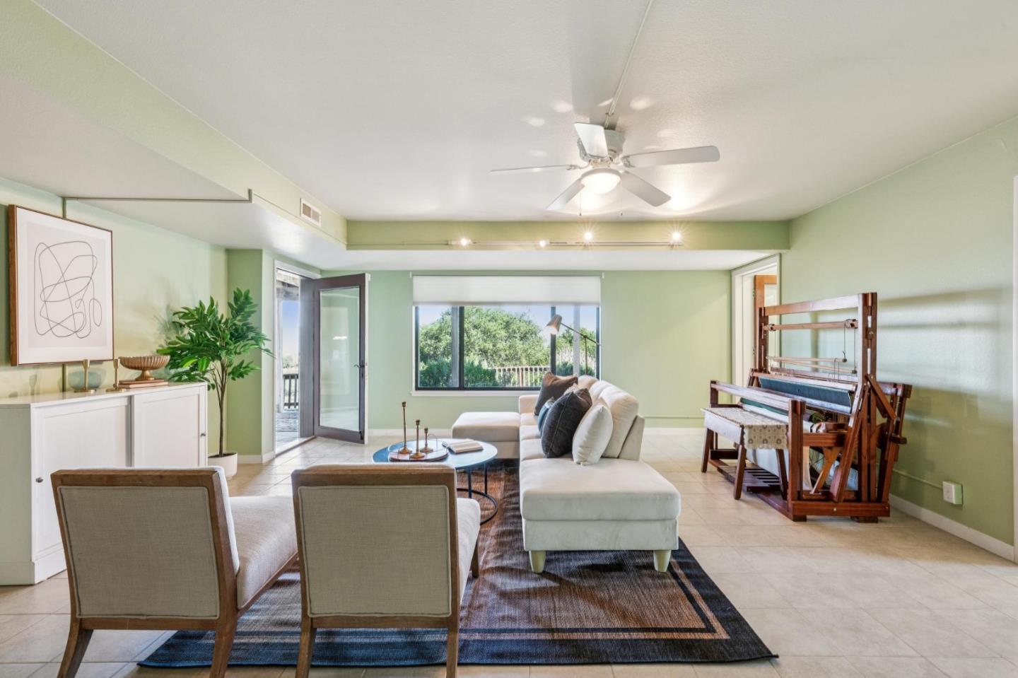 26245 Rinconada Drive Carmel Valley, CA 93924 - Photo 16 of 19 a living room with furniture and a large window