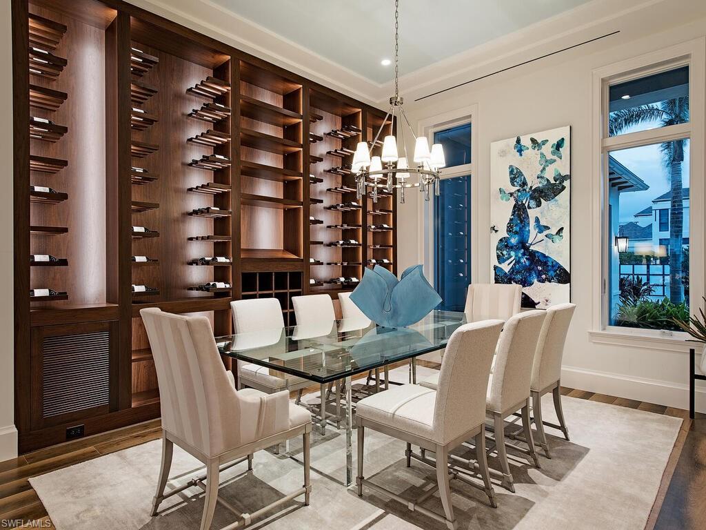 3320 Rum Row Naples, FL 34102 - Photo 16 of 39 a dining room with furniture and window