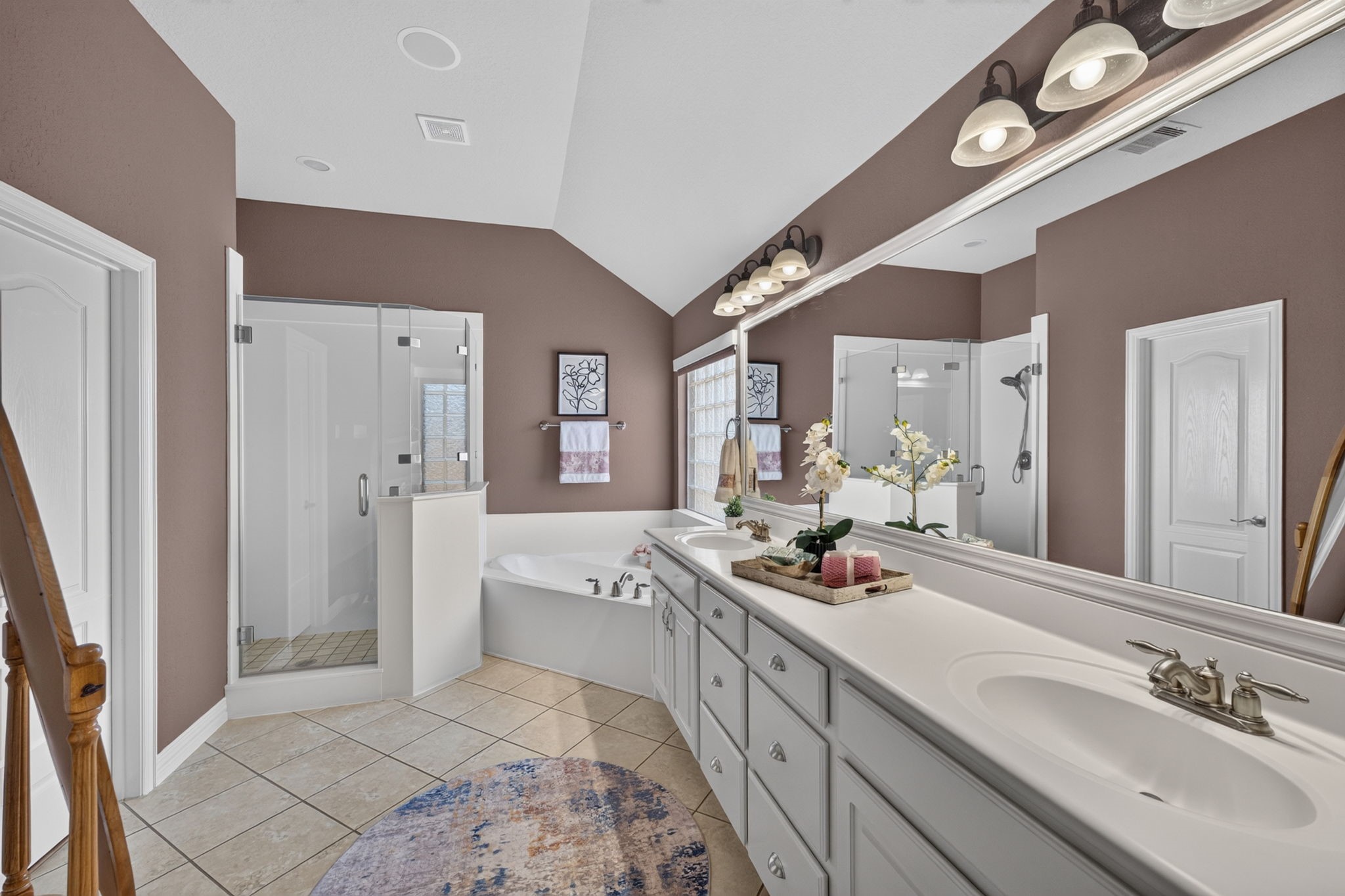 514 Oak Ridge Grove Circle Spring, TX 77386 - Photo 19 of 35 An expansive double vanity provides abundant counter space, extensive cabinetry and framed mirror for comfortable daily routines.