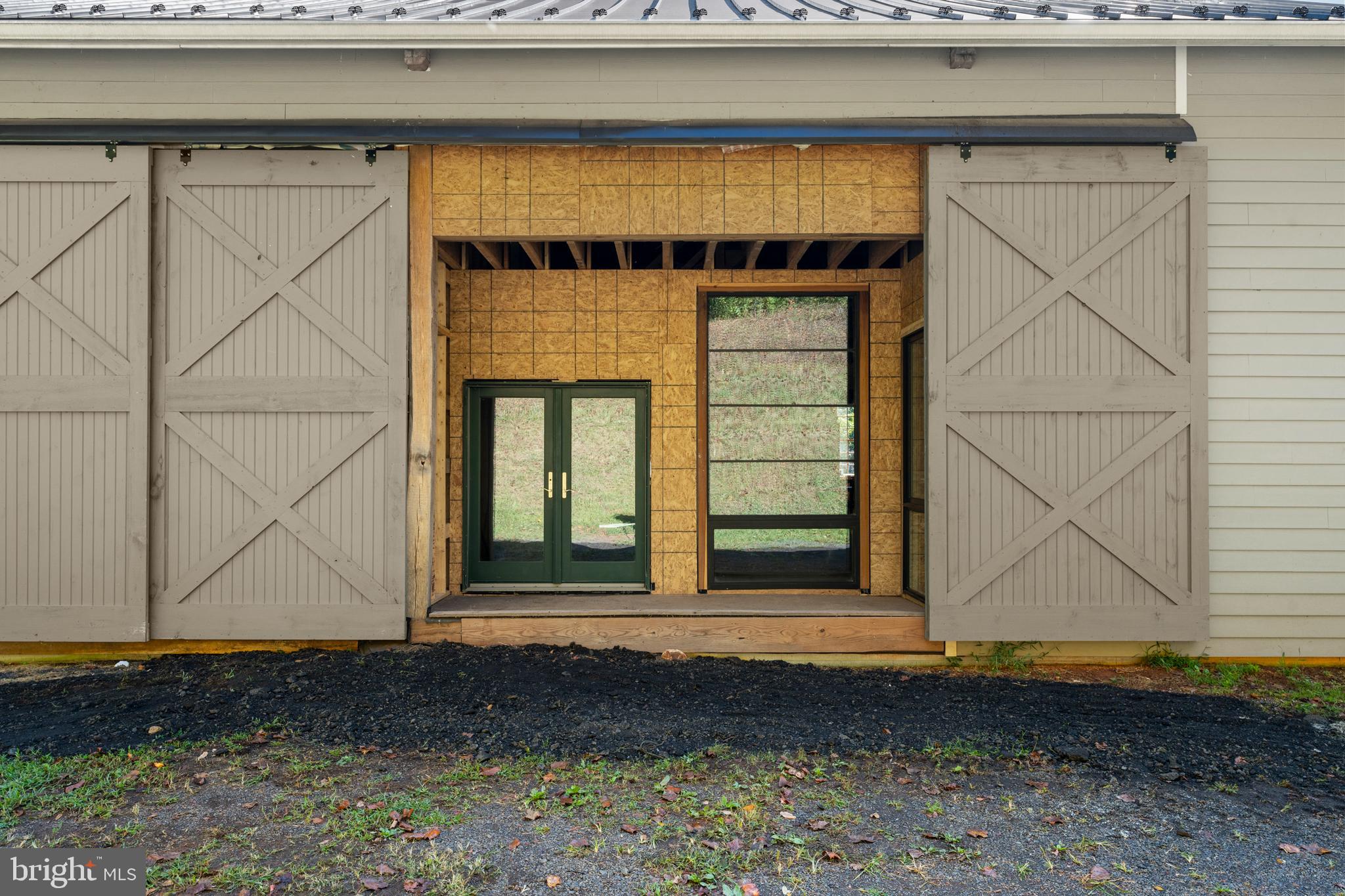 439 Rudasill Mill Road Woodville, VA 22749 - Photo 41 of 48 Four extra-tall sliding barn doors