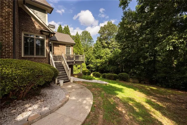 a view of a back yard of the house