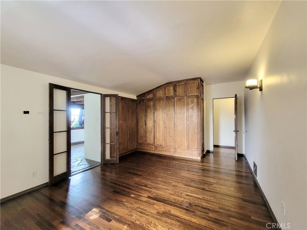 603 Termino Avenue Long Beach, CA 90814 - Photo 16 of 21 a view of empty room with wooden floor