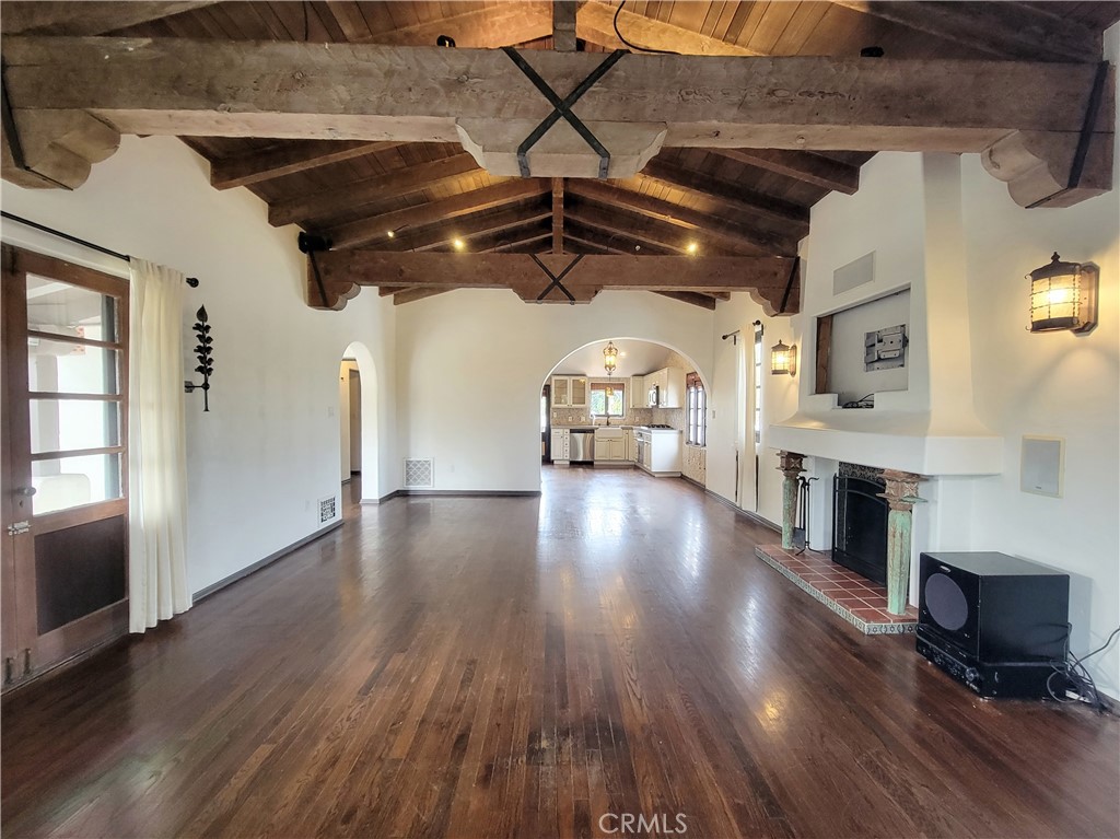 603 Termino Avenue Long Beach, CA 90814 - Photo 2 of 21 a view of livingroom and fireplace with wooden floor