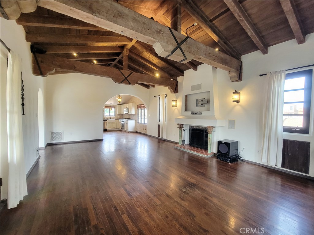 603 Termino Avenue Long Beach, CA 90814 - Photo 5 of 21 a view of livingroom with hardwood floor and a fireplace