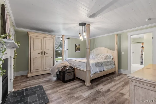 a living room with furniture and fireplace