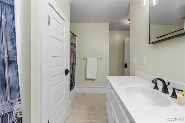 a view of an entryway with wooden floor and door