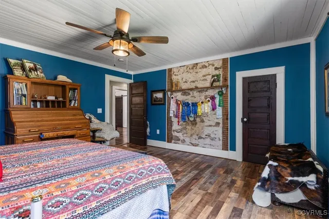 a view of hallway with wooden floor
