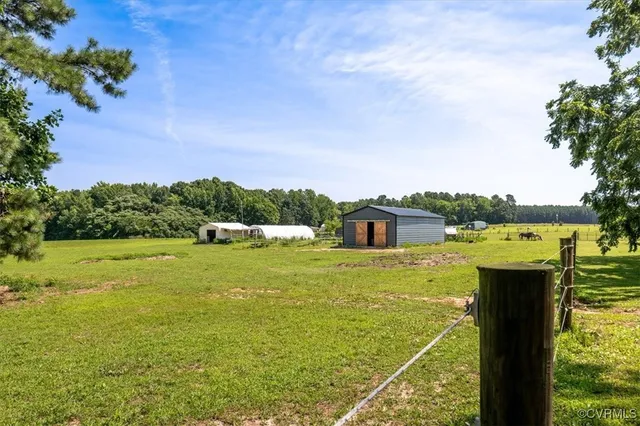 a view of a lake with couches in the ocean