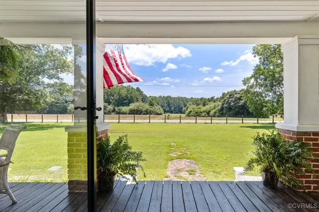 a room with furniture and a window