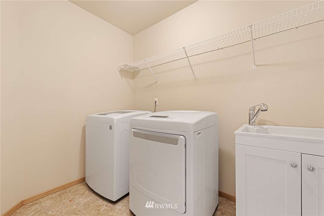 21215 40th Drive Southeast Bothell, WA 98021 - Photo 23 of 25 a utility room with dryer and washer
