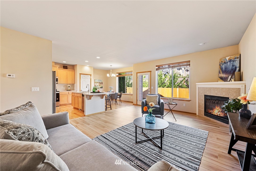 21215 40th Drive Southeast Bothell, WA 98021 - Photo 6 of 25 a living room with furniture and a fireplace