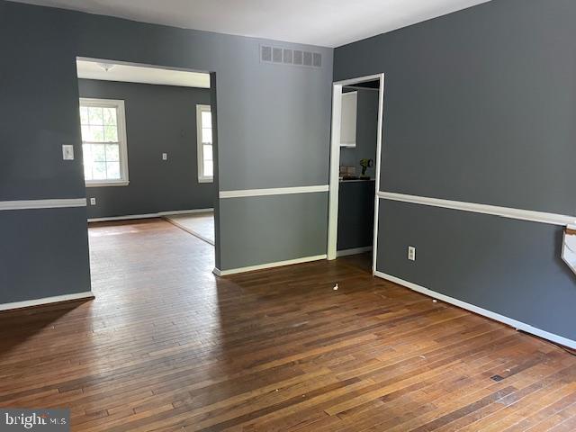 3545 Moultree Place Nottingham, MD 21236 - Photo 14 of 28 wooden floor in an empty room with a window