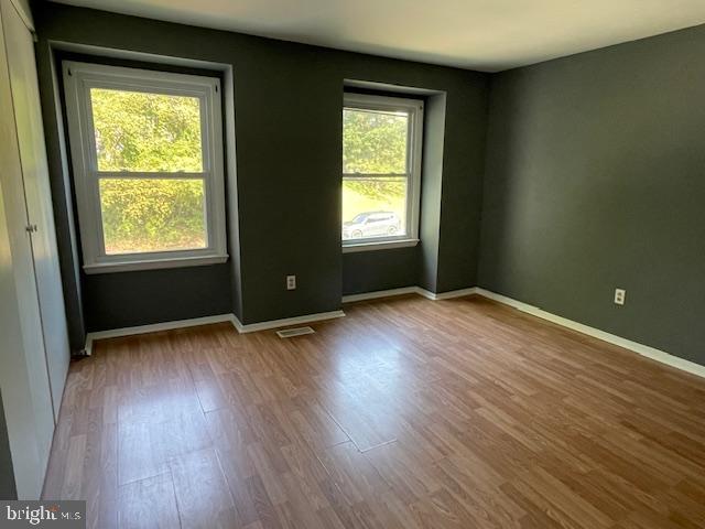 3545 Moultree Place Nottingham, MD 21236 - Photo 10 of 28 a view of an empty room with wooden floor and a window