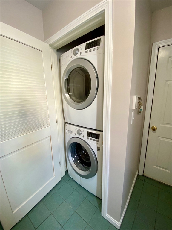 985 Trapelo Road, Unit 6 Waltham, MA 02452 - Photo 13 of 14 a utility room with sink dryer and washer