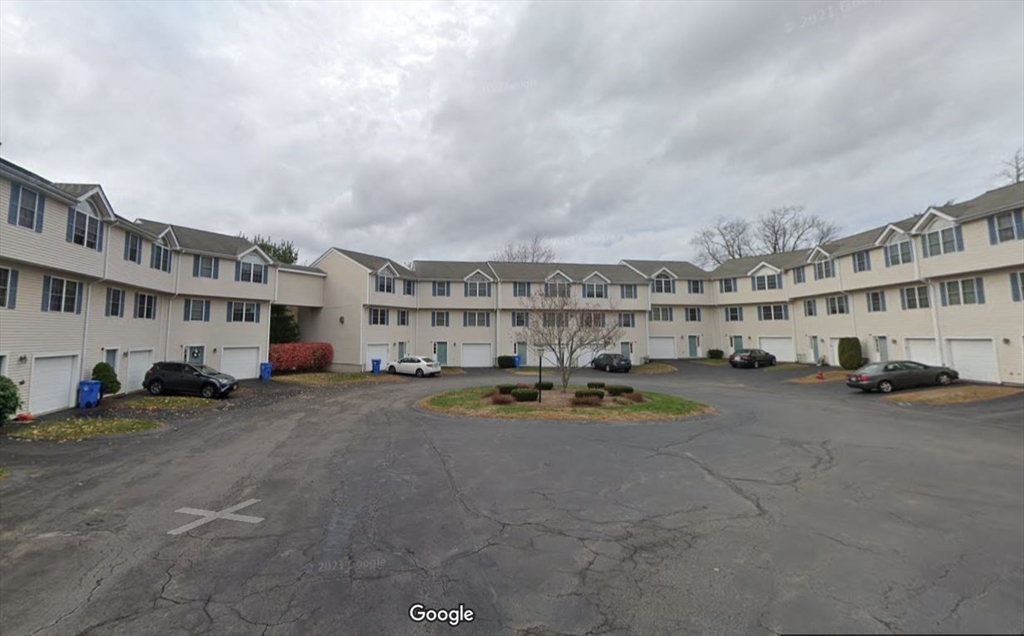 985 Trapelo Road, Unit 6 Waltham, MA 02452 - Photo 14 of 14 a view of a street with cars