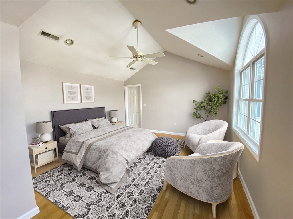 985 Trapelo Road, Unit 6 Waltham, MA 02452 - Photo 8 of 14 a bedroom with furniture and a window
