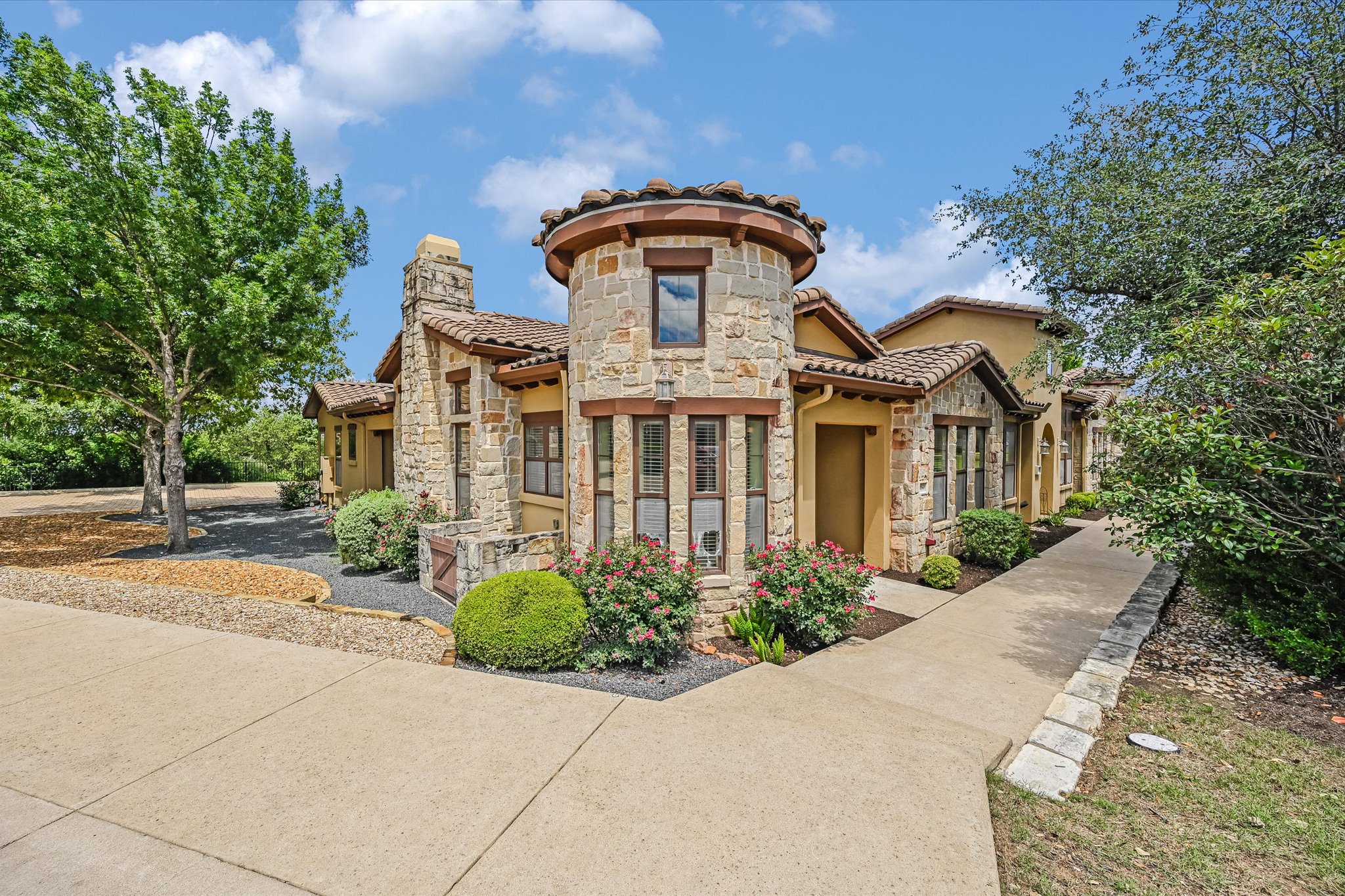 103 Rivalto Circle, Unit 1 Lakeway, TX 78734 - Photo 1 of 34 End unit townhome in the Triangle at Tuscan Village
