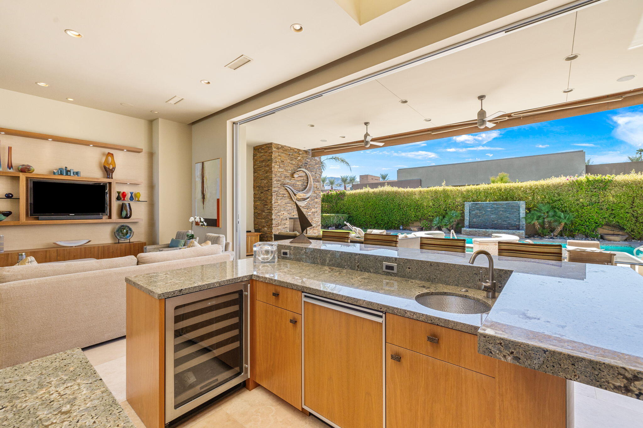 28 Sun Ridge Circle Rancho Mirage, CA 92270 - Photo 11 of 59 a view of a kitchen with a sink and a large window