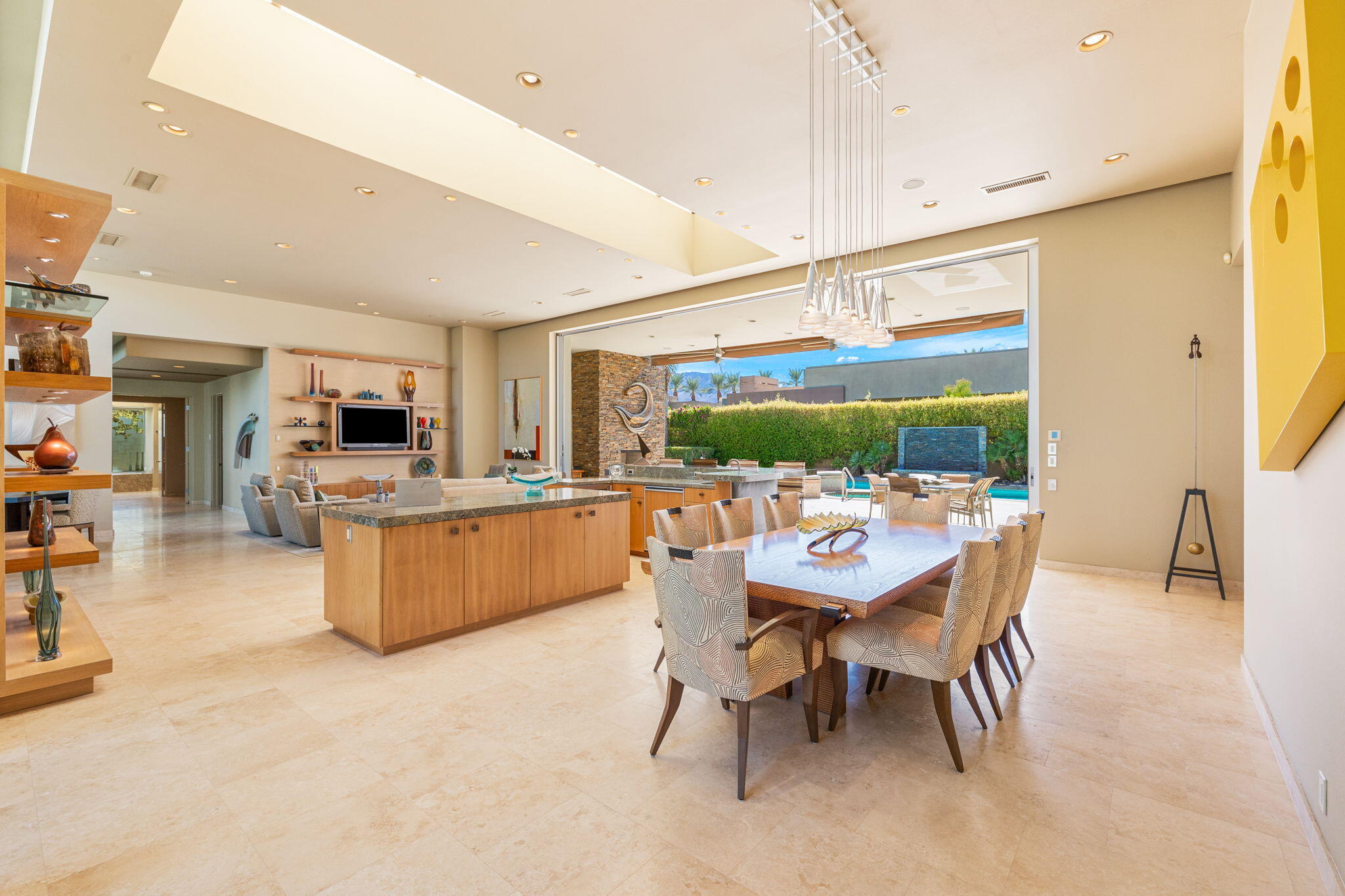 28 Sun Ridge Circle Rancho Mirage, CA 92270 - Photo 14 of 59 a dining room with furniture and a large window