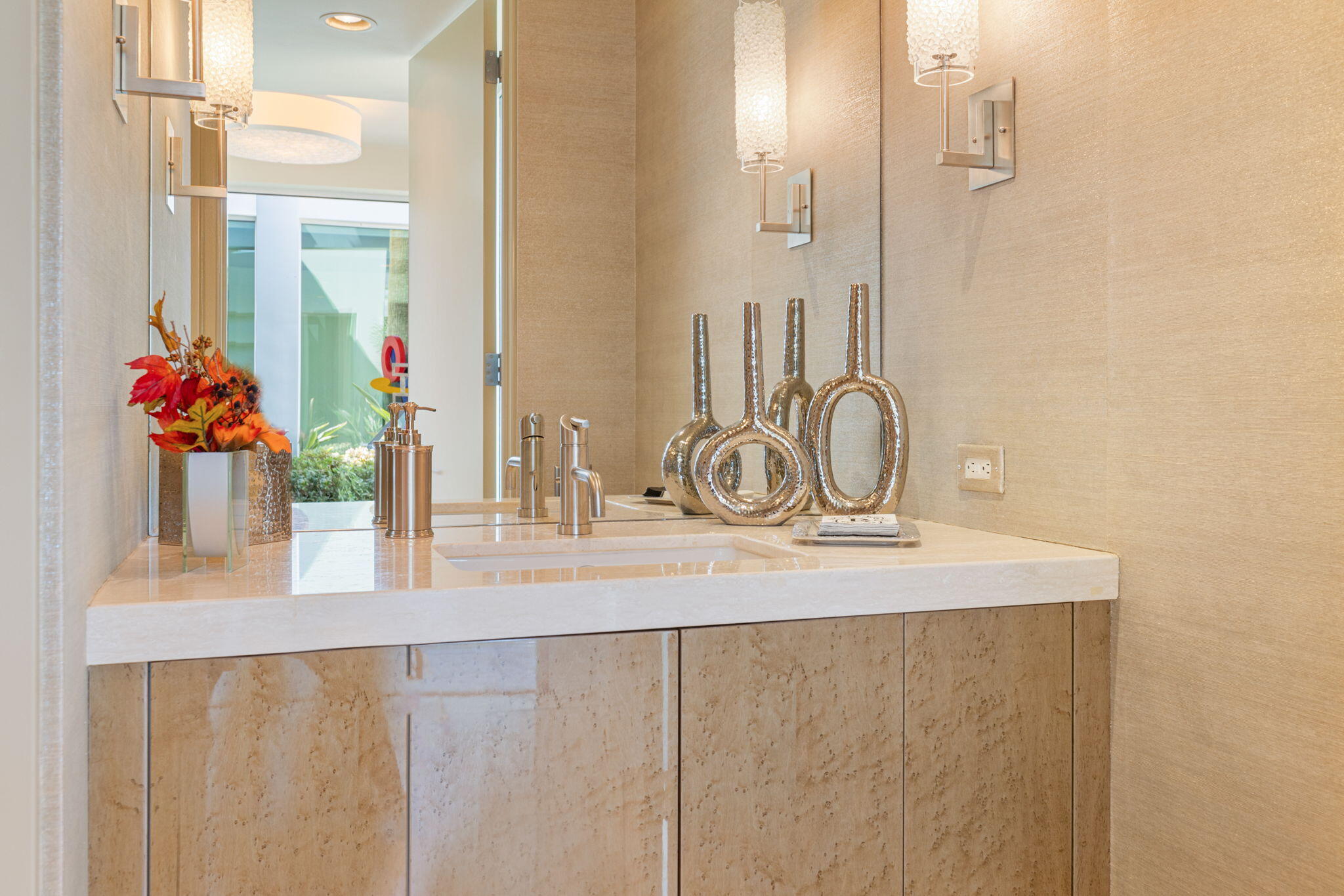 28 Sun Ridge Circle Rancho Mirage, CA 92270 - Photo 16 of 59 a bathroom with a sink and mirror