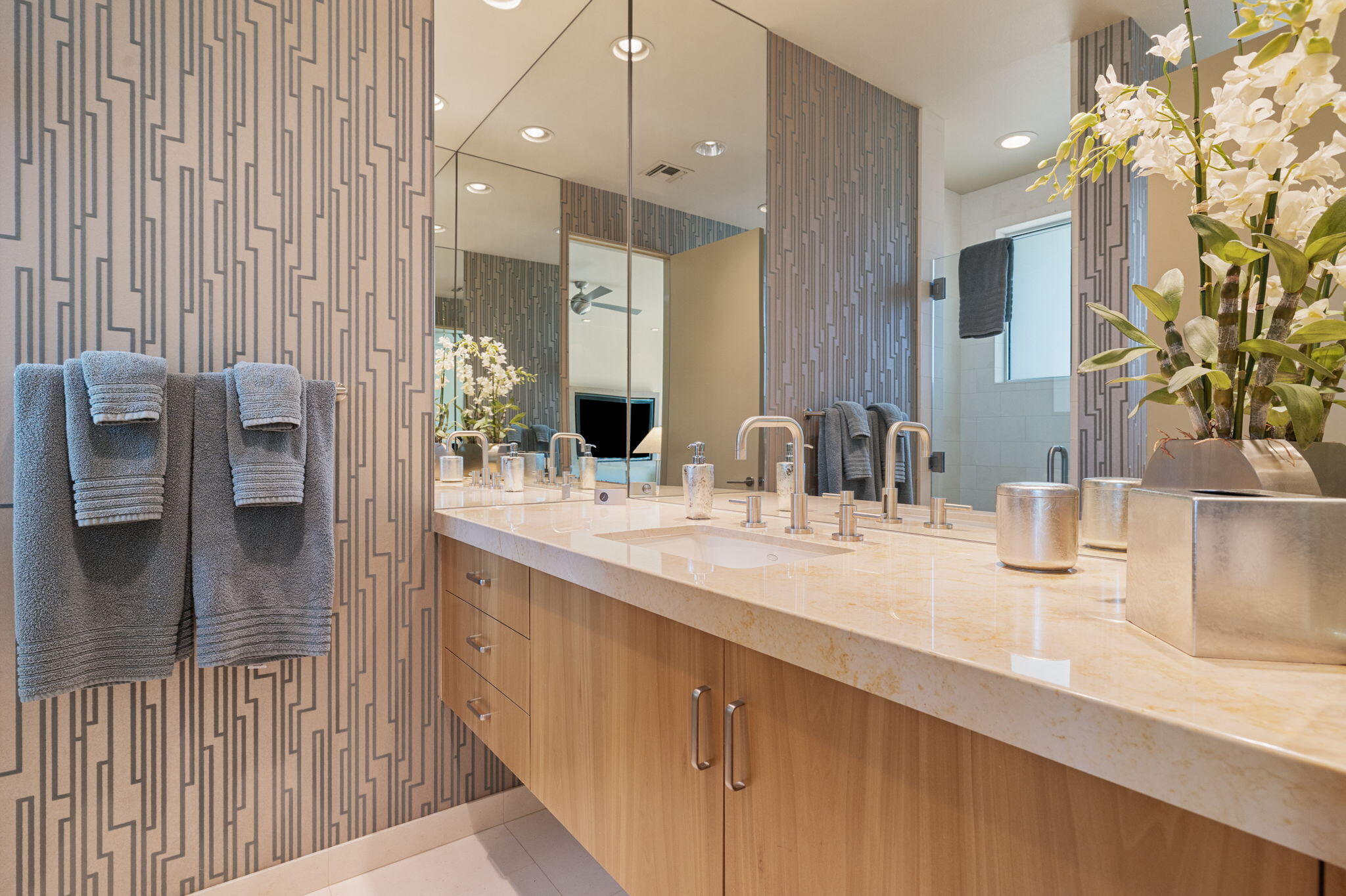 28 Sun Ridge Circle Rancho Mirage, CA 92270 - Photo 27 of 59 a bathroom with a double vanity sink and a mirror