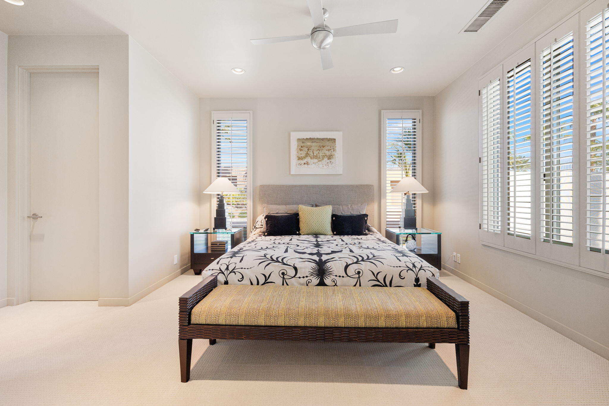 28 Sun Ridge Circle Rancho Mirage, CA 92270 - Photo 43 of 59 a bedroom with a large bed and a window