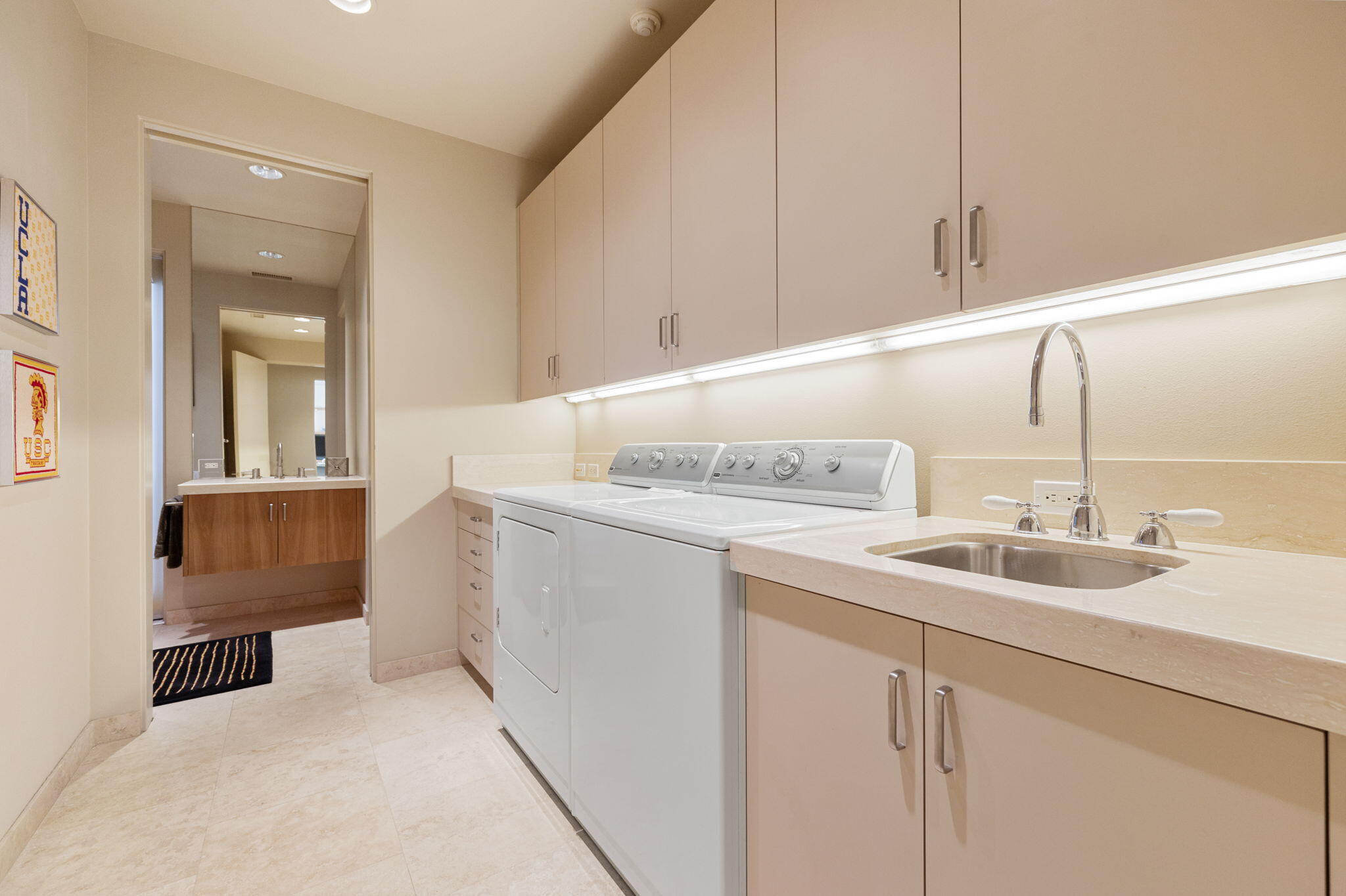 28 Sun Ridge Circle Rancho Mirage, CA 92270 - Photo 46 of 59 a kitchen with sink and mirror