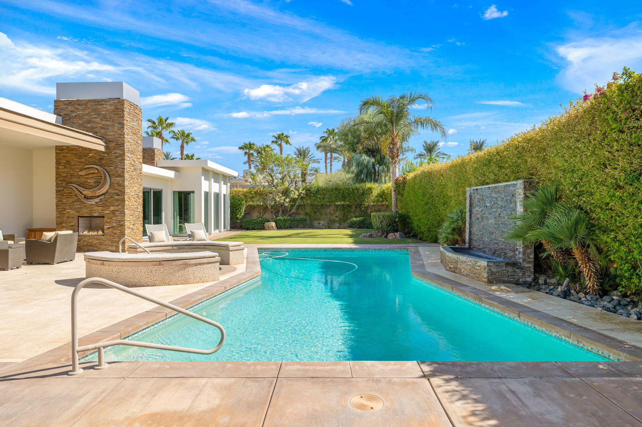 28 Sun Ridge Circle Rancho Mirage, CA 92270 - Photo 48 of 59 a view of a house with swimming pool