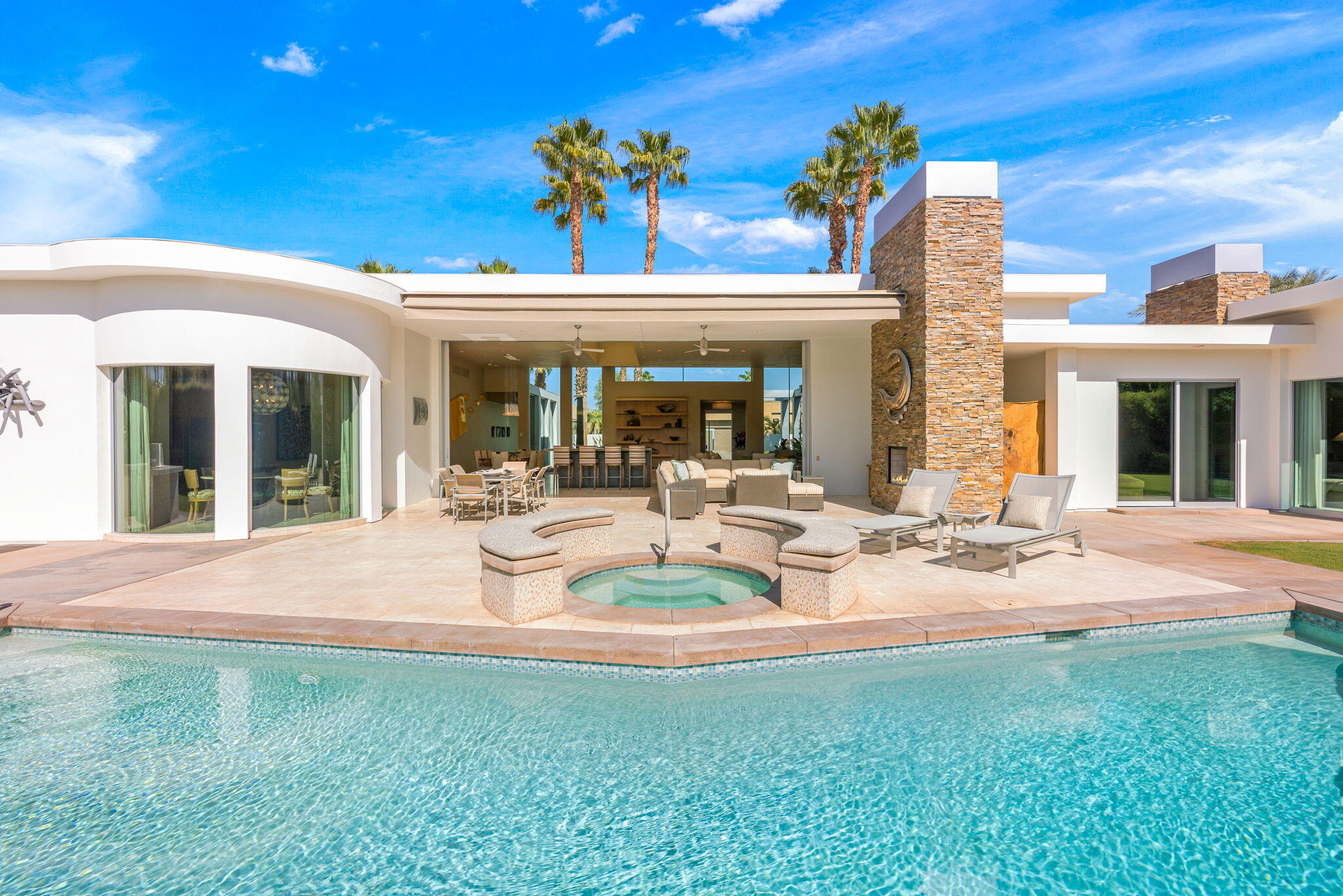 28 Sun Ridge Circle Rancho Mirage, CA 92270 - Photo 51 of 59 a view of a house with backyard porch and patio
