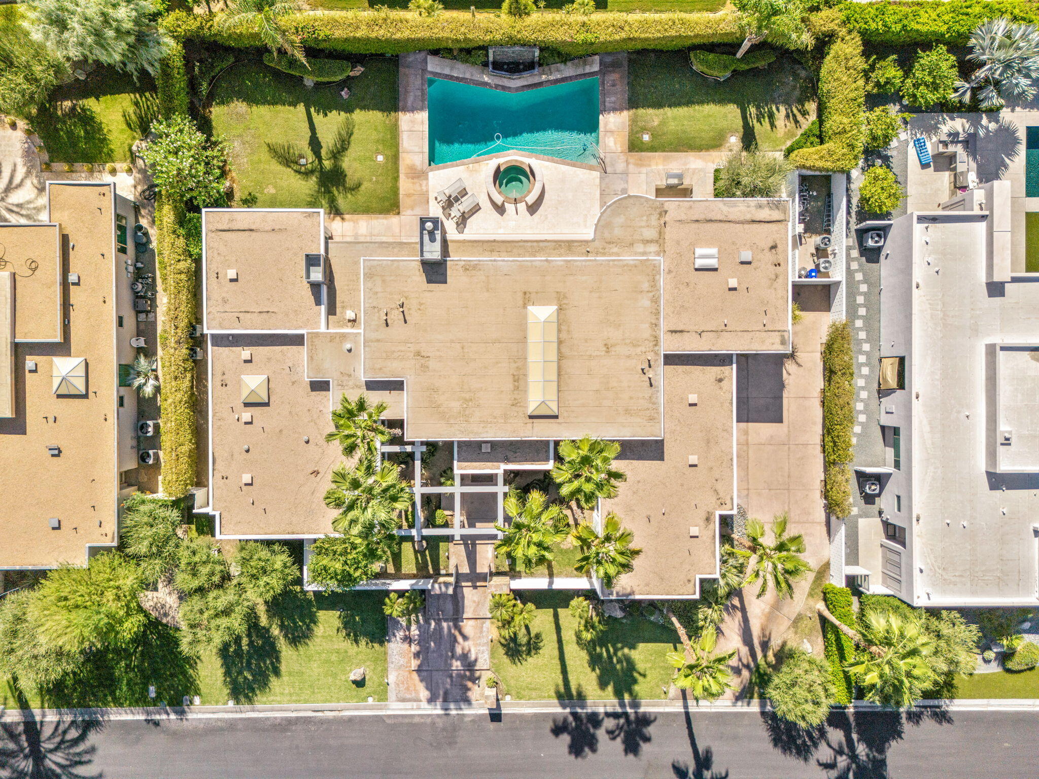 28 Sun Ridge Circle Rancho Mirage, CA 92270 - Photo 59 of 59 a picture of a building with a lot of flower plants