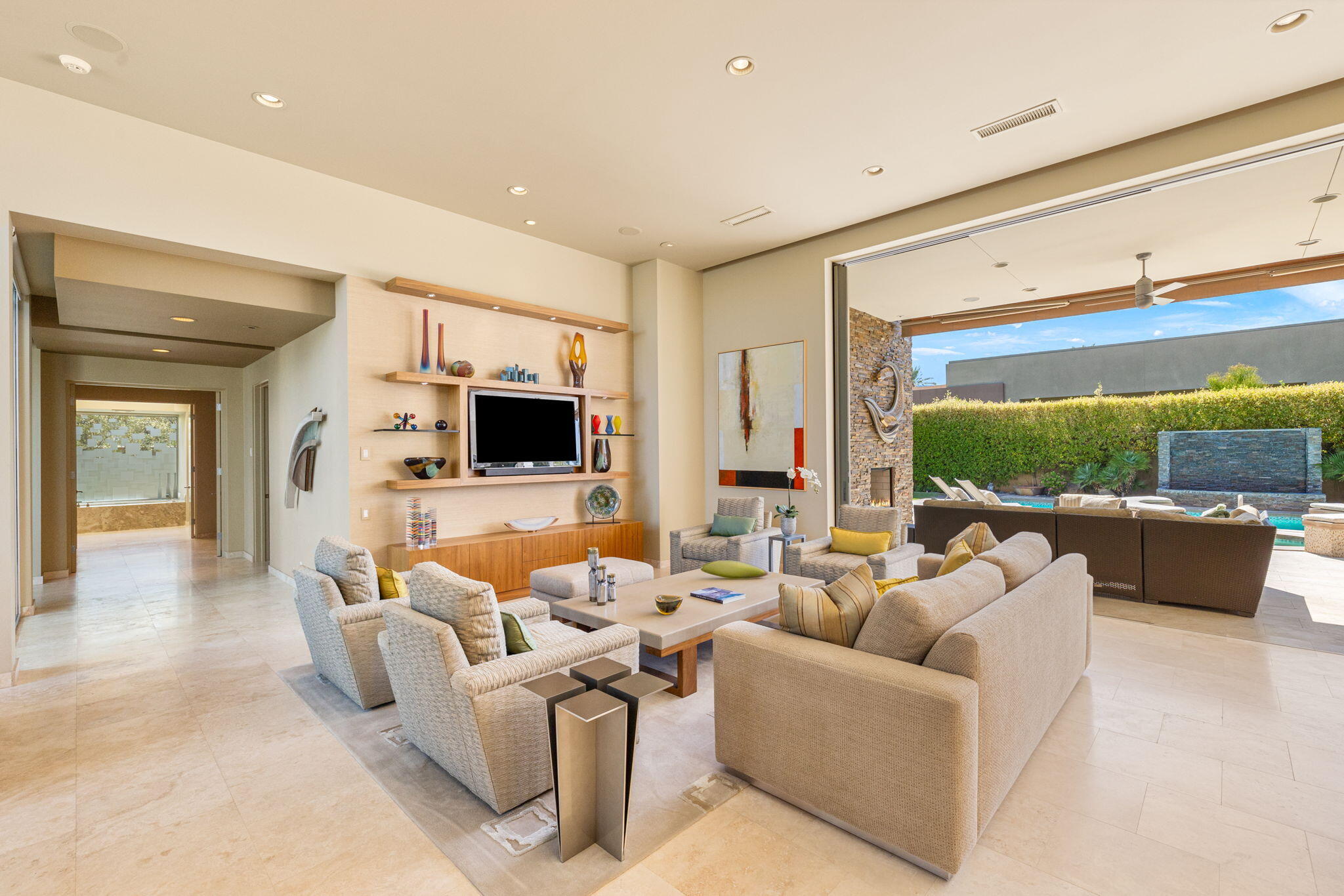 28 Sun Ridge Circle Rancho Mirage, CA 92270 - Photo 6 of 59 a living room with furniture and a flat screen tv