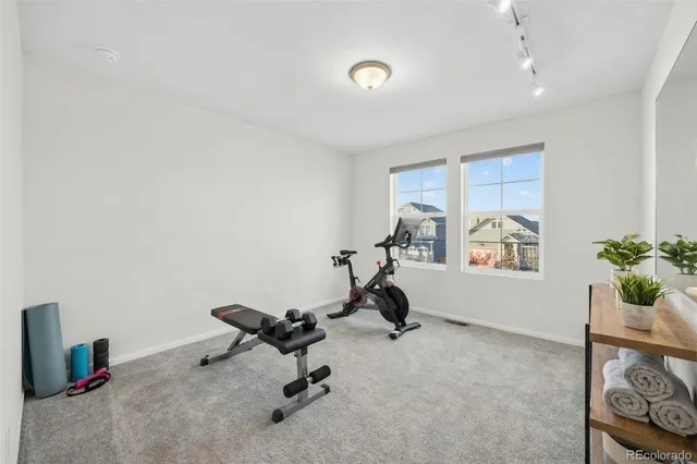 a view of a room with gym equipment