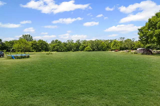 a view of a lake from a yard